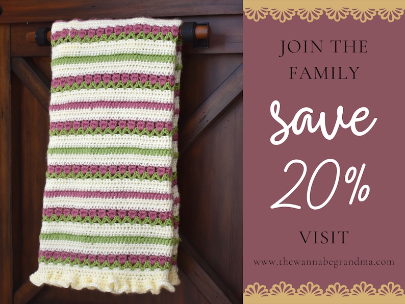 May include: A crocheted blanket with pink, green, and white stripes hangs on a wooden door. The blanket has a crocheted ruffle around the bottom edge. The text on the sign reads "Join the Family Save 20% Visit www.thewannabegrandma.com"