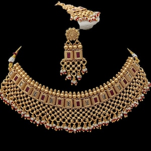 Conjunto de joyería tikka con collar y pendientes de rubí para novia india chapado en oro de 22 quilates