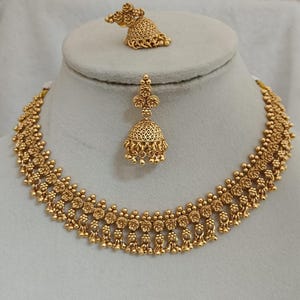 Zestaw pozłacanych indyjskich kolczyków i naszyjników ślubnych | Ruby Accent