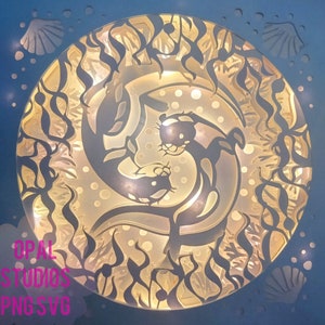 Mignonnes loutres câlinant main dans la main nageant lac mer étang découpe de papier 3d shadowbox boîte d'ombre lumière SVG numérique Cricut modèle-