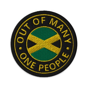 May include: A black and gold embroidered patch with the Jamaican flag in the center and the words "Out of Many, One People" around the flag.