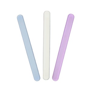 May include: Three nail files, one light blue, one white, and one light purple.