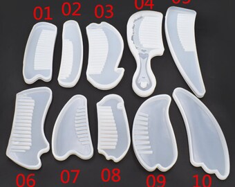 May include: Ten silicone molds for making resin combs. The molds are numbered 01 through 10. The molds are all different shapes and sizes. Some of the molds are shaped like traditional combs, while others are more decorative.