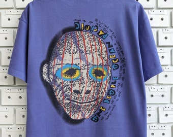 Camiseta vintage Ocean Pacific de los años 90, ropa de surf urbana, marca Street Surf, estampado en la parte posterior, camiseta con gráfico de cara multicolor, talla L