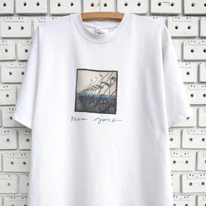 Vintage 00s Nike Golf T-Shirt Push Pull Trolley Cart Grafik Art Print Tee Größe M/L