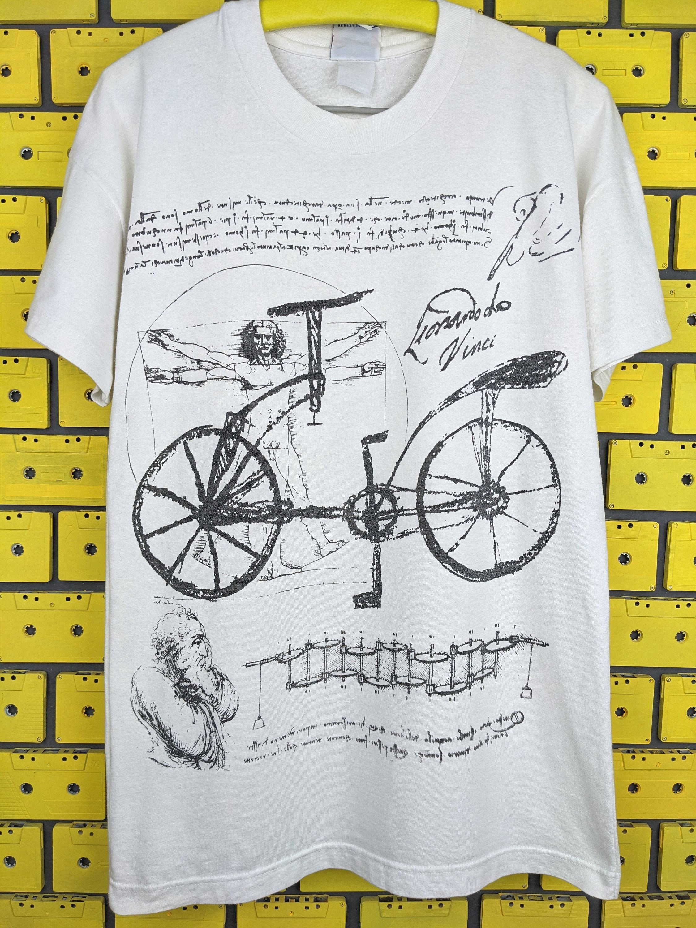 Vintage 90s Leonardo Da Vinci T-shirt Vitruvian Man Bicycle Sketch