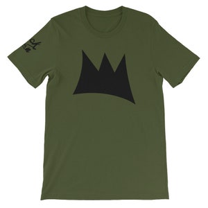 May include: Olive green t-shirt featuring a large black crown design on the front. The short-sleeved shirt has a crew neck and a small black text on the left sleeve. The shirt is made of a soft material.