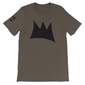 May include: A short-sleeved, olive-green t-shirt featuring a large black crown graphic on the front. The sleeve has the text "Black Crown" printed in black. The shirt is made of a soft material.