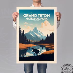 May include: A vintage-style poster featuring a scenic view of Grand Teton National Park, established in 1929. The poster depicts a mountain range with snow-capped peaks, a lake reflecting the mountains, and a silhouette of a moose in the foreground. The text "Grand Teton National Park" is displayed in bold letters at the top of the poster.