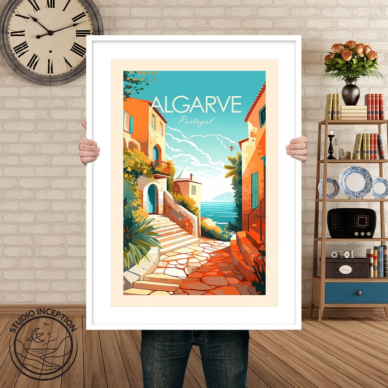 May include: A vintage travel poster with a colorful illustration of a cobblestone street in a European town. The poster features a blue sky, a bright blue ocean, and the text "ALGARVE Portugal".