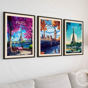Puede incluir: Tres impresiones enmarcadas de paisajes urbanos. Las impresiones de la izquierda y la derecha presentan una vista de la Torre Eiffel en Par&iacute;s, Francia. La impresi&oacute;n del medio presenta una vista del Palacio de Westminster y el Big Ben en Londres, Inglaterra.
