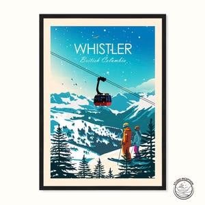 May include: A framed art print featuring a winter scene of Whistler, British Columbia. The artwork depicts a red gondola, skiers, and snow-covered mountains under a blue sky. The text "Whistler British Columbia" is at the top.