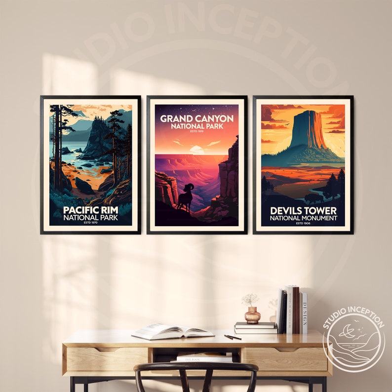 May include: Three framed vintage-style posters featuring national parks. The posters are in a minimalist style with a sunset colour palette. The posters feature the Grand Canyon National Park, Pacific Rim National Park, and Devils Tower National Monument.