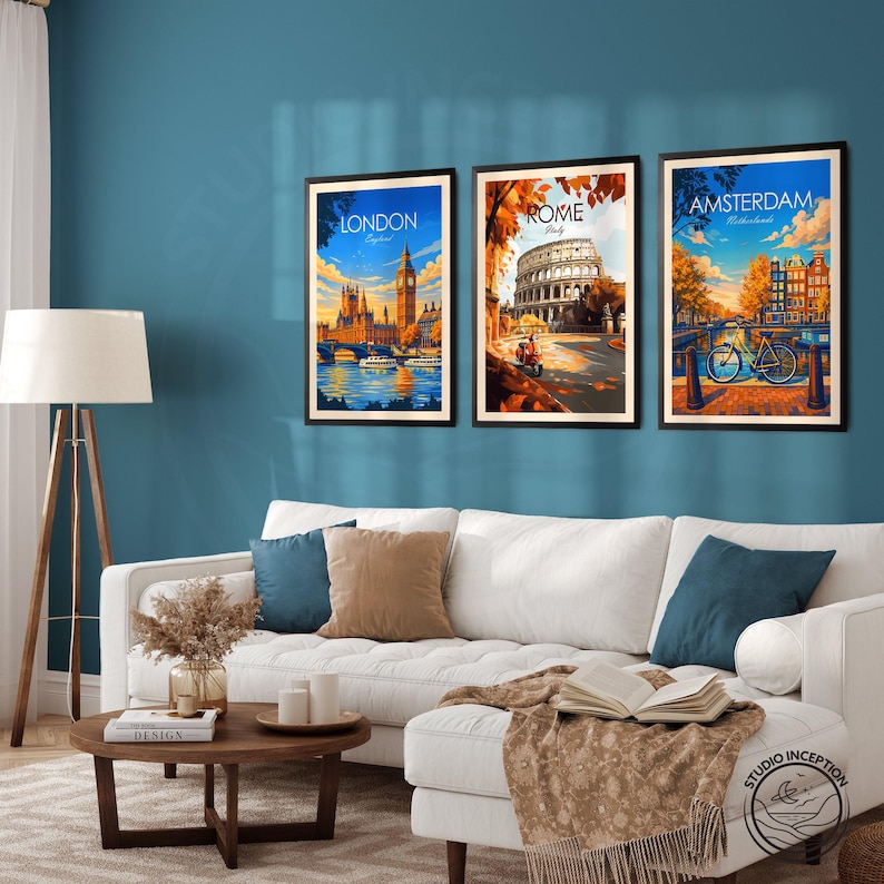 May include: Three framed travel posters depicting London, Rome, and Amsterdam. The London poster shows Big Ben and the Houses of Parliament. The Rome poster features the Colosseum. The Amsterdam poster displays a bicycle on a bridge.