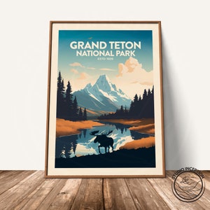 May include: A vintage-style poster with a blue, green, and brown color scheme depicting a mountain range with a lake in the foreground. The text "Grand Teton National Park Estd 1929" is at the top of the poster. A silhouette of a moose is standing in the lake.