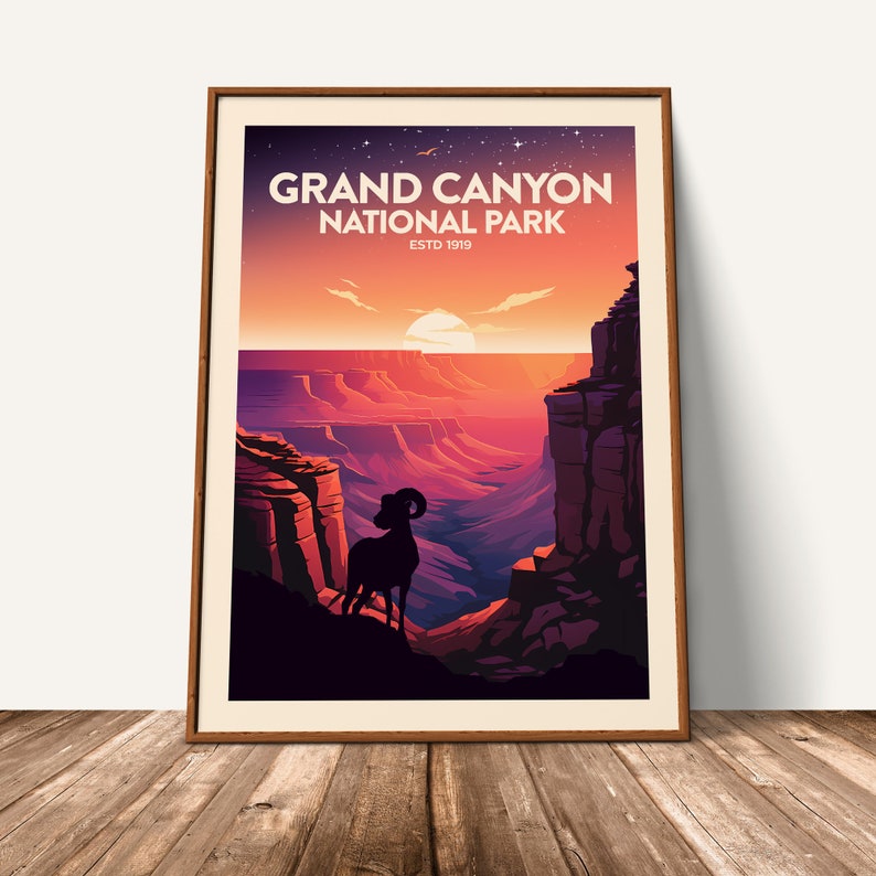 May include: A vintage-style poster featuring a silhouette of a bighorn sheep standing on a cliff overlooking the Grand Canyon. The poster has a sunset sky with a bright orange sun and the text "Grand Canyon National Park Estd 1919".