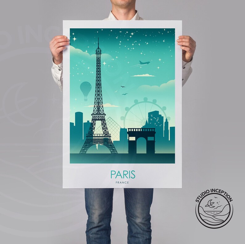 May include: A teal and blue poster with a silhouette of the Eiffel Tower and the Arc de Triomphe in Paris, France. The poster also features a hot air balloon, a Ferris wheel, and a plane in the sky. The text "PARIS FRANCE" is at the bottom of the poster.