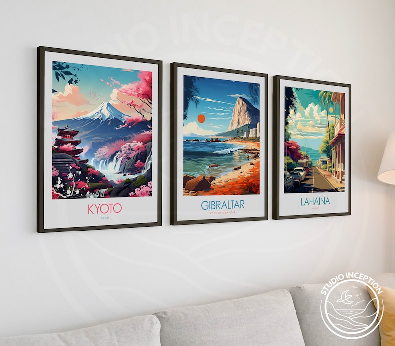 May include: Three framed travel posters with colorful illustrations of Kyoto, Japan, Gibraltar, and Lahaina, Hawaii. The posters have a vintage aesthetic and feature the city name in white text at the bottom.