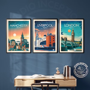 May include: Three framed illustrations of cityscapes with the city names "Manchester", "Liverpool", and "London" printed at the top. Each illustration features a sunset sky with a prominent landmark in the city.
