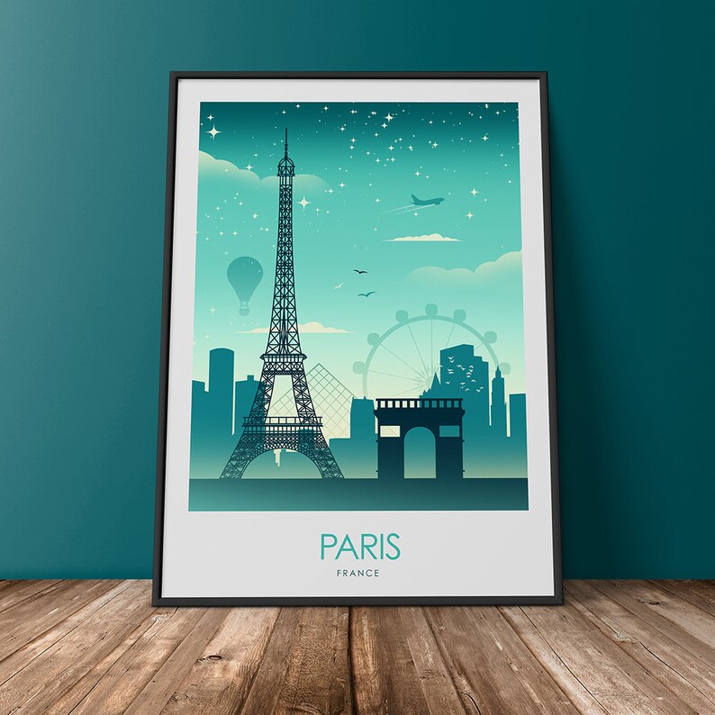 May include: A teal and blue illustrated poster with a silhouette of the Eiffel Tower, the Arc de Triomphe, and other Parisian landmarks. The poster has the text "PARIS" and "FRANCE" at the bottom.