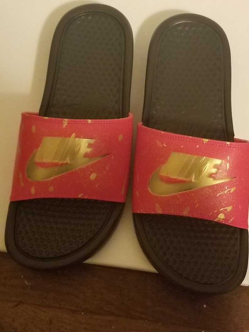 maroon gold nike slides