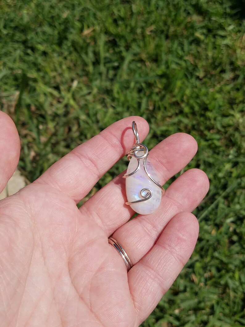 Blue fire rainbow moonstone wire wrapped pendant