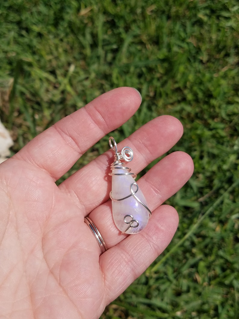 Blue fire rainbow moonstone wire wrapped pendant