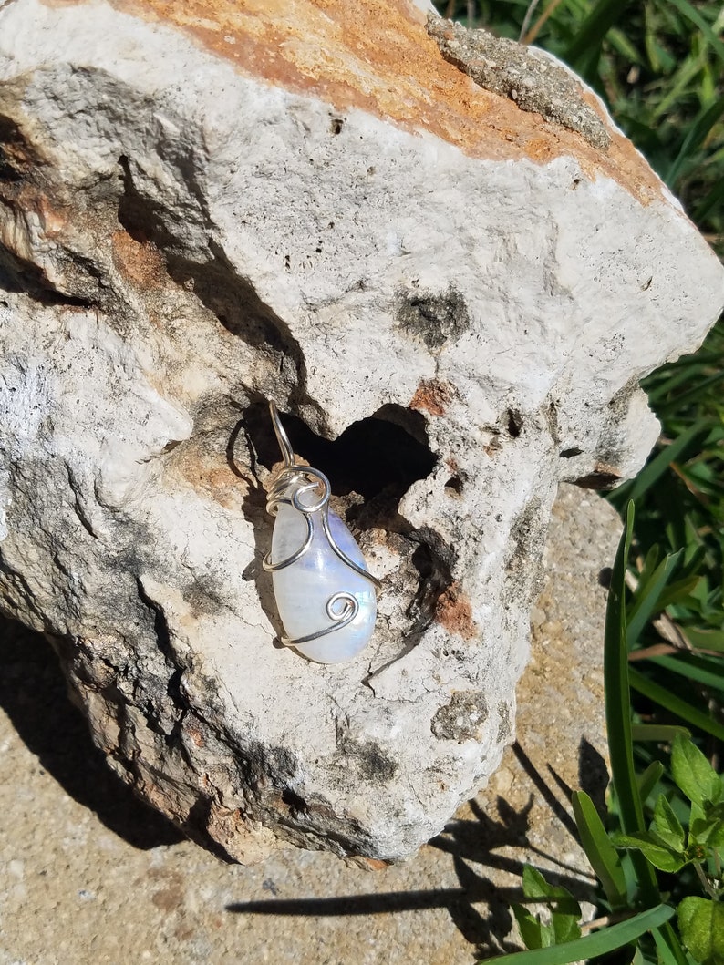 Blue fire rainbow moonstone wire wrapped pendant