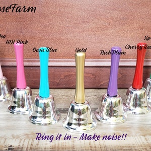 Handheld Bell for ringing in happiness at Weddings, Anniversaries and When you want him to bring you a drink!