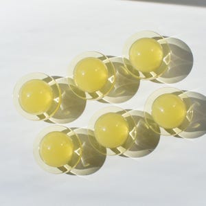 Set of 6 handmade yellow funky round see-through knobs