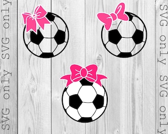 May include: Three black and white soccer balls with pink bows on top. The soccer balls are on a woodgrain background. SVG only is written on the sides of the image.
