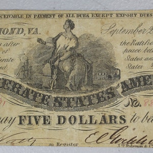 May include: A black and white Confederate States of America five dollar bill, dated September 2, 1861. The bill features a vignette of a woman standing on a pedestal, with a ship in the background. The bill is signed by C.H. Matty, Register, and E. Churchell, Treasurer.