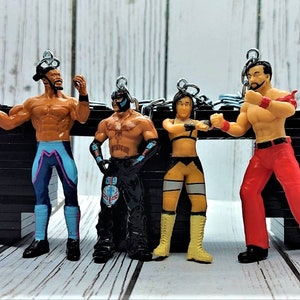 WWE Figure Key chain Kofi Braun The Rock Bayley Undertaker Daniel Rey Seth Shinsuke Alexa Bliss Cake Toppers and Gift Bag Option