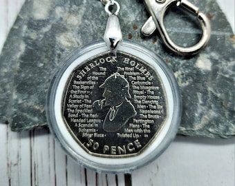 Sherlock Holmes-sleutelhanger, 50 st munt in een capsule