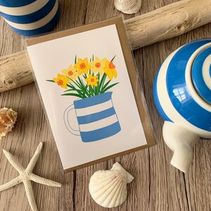 Greeting card with daffodils in a Cornishware jug.