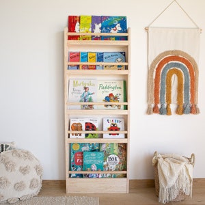 Slim and narrow montessori bookshelf with five shelves made of pine wood