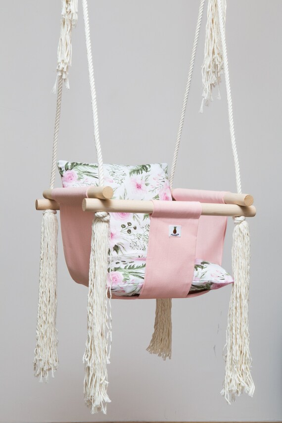 pink and grey baby swing