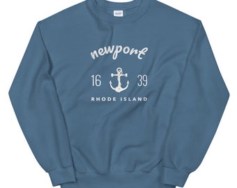 May include: A blue sweatshirt with white text that reads "newport 16  39 RHODE ISLAND" and a white anchor graphic.