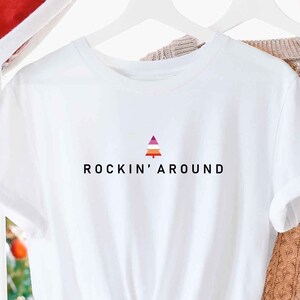 Rockin Around LGBTQ Lesbian Christmas Shirt, Subtle Lesbian Flag Pride Christmas Unisex Tee, Lesbian Holiday Decor, Queer Lesbian Xmas Gift