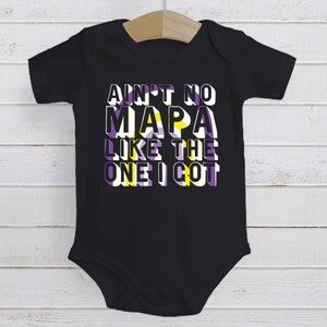 May include: Black baby onesie with the text "Ain't no mapa like the one I got" in a purple, yellow, and white color scheme.