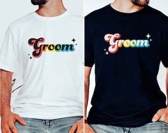 Camisa arco iris del novio de la despedida de soltero gay, camisa de la fiesta de bodas gay para la parte superior de la boda queer de dos novios, regalo del novio gay para la camiseta unisex de la luna de miel gay