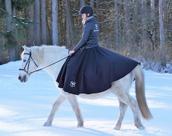 Riding skirt with zipper and cuffs.