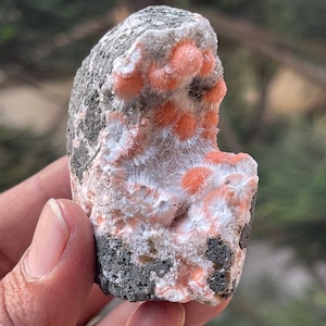 Orange mesolite balls on heulandite matrix