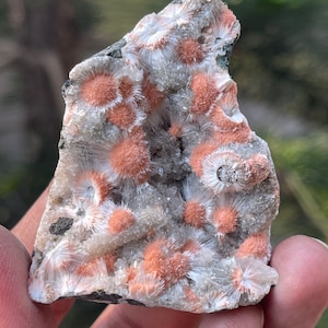 Orange mesolite crystal on heulandite matrix