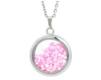 Silver locket filled with pink stars