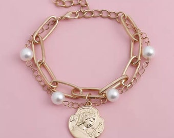 Simulated Pearl and Gold Coin link bracelet.