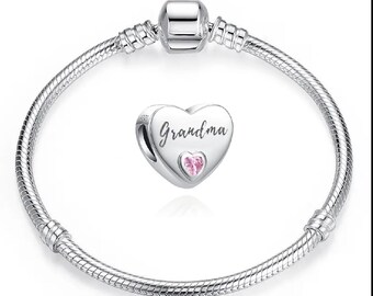 Sterling Silver charm and silver plated bracelet.