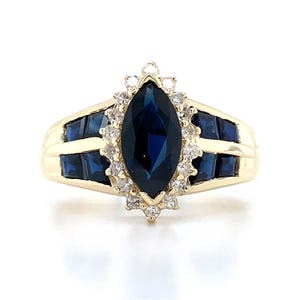 14k Yellow Gold Marquise Blue Sapphire Center W/Baguette Sapphire & Diamond Ring