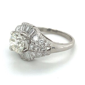 Vintage Iridium Platinum Round Cut Diamond W/ Single & Baguette Cut Diamond Ring