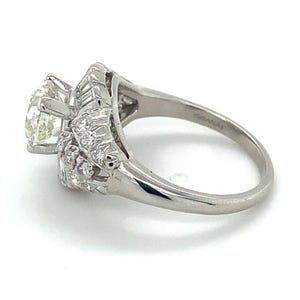 Vintage Iridium Platinum Round Cut Diamond W/ Single & Baguette Cut Diamond Ring